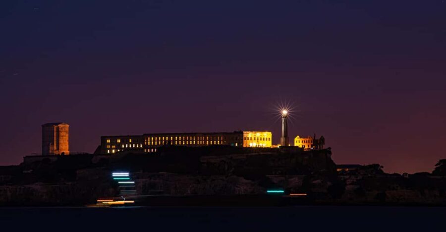 San Francisco: Alcatraz Night Tour with SF Bay Cruise - Inside the island: audio-led exploring, cell doors, and exhibits